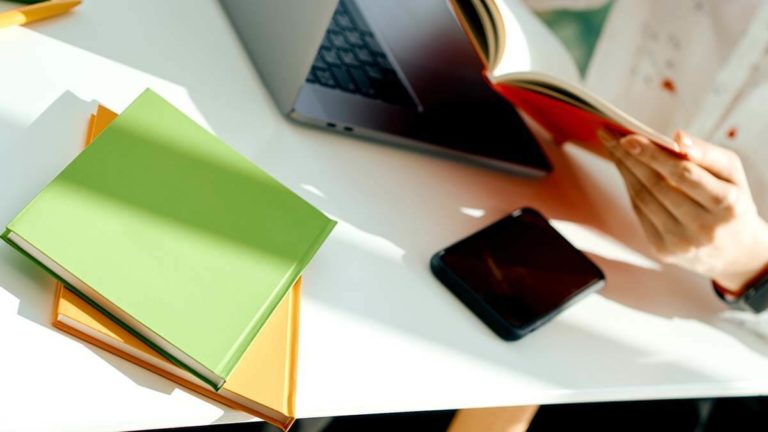 Binders on a desk.